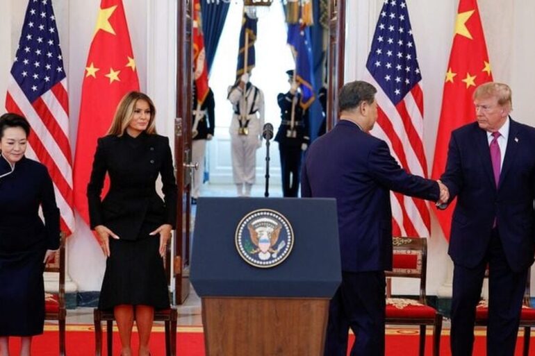Donald Trump et Xi Jinping se saluant lors de leur sommet à Washington en septembre 2026.